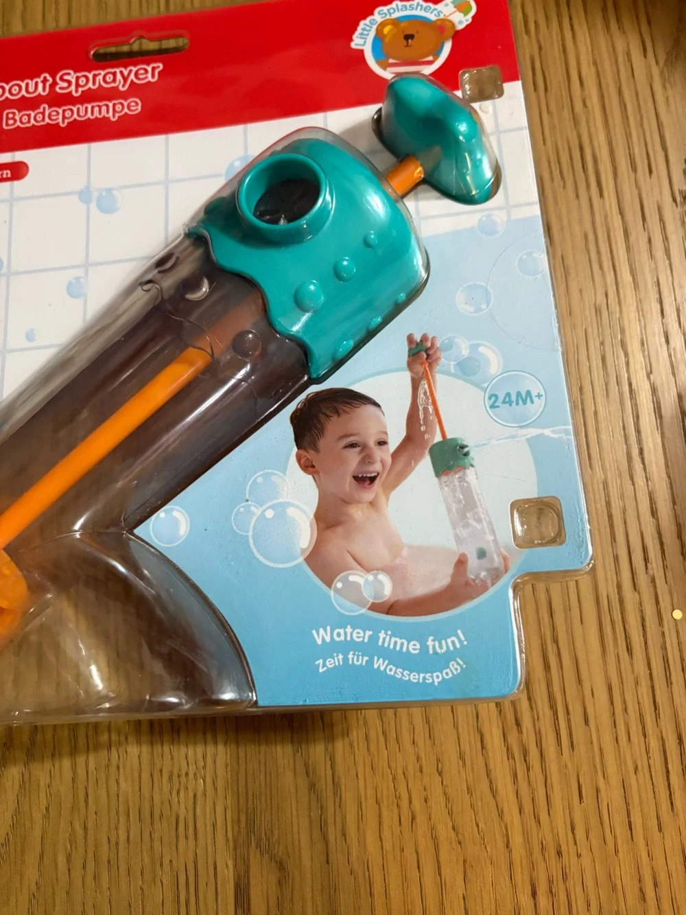 Hape Multi-Spout Sprayer Bath Toy – Teal & Orange